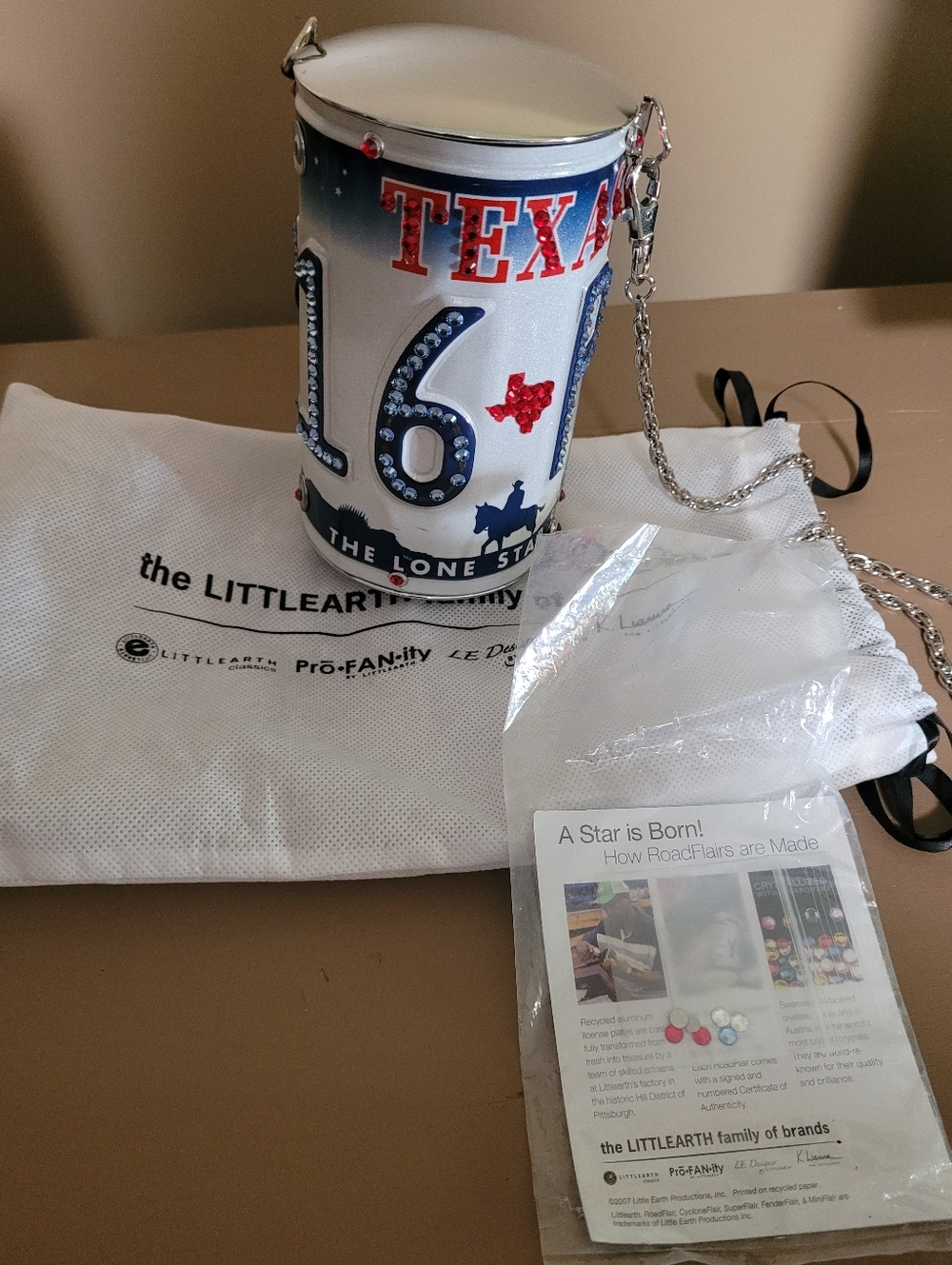 Little Earth Silver Can Crossbody with Blue and Red Accents